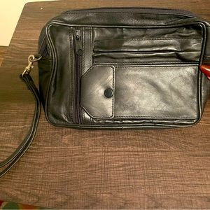 Genuine leather unisex bag with pockets and cellphone pocket